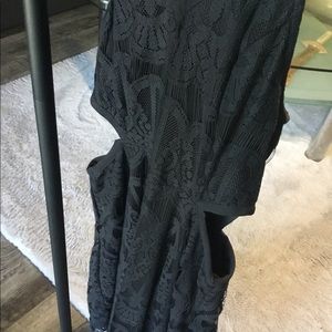 Women’s black dress with side cutouts